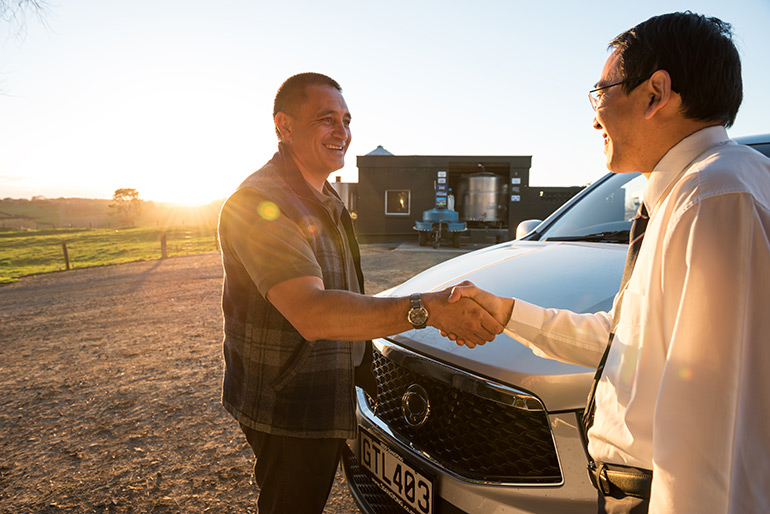 Two people shaking hands